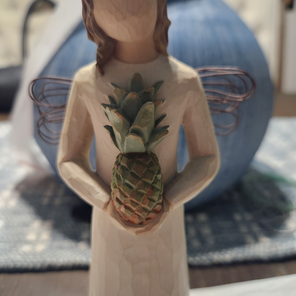 Elegant Angel Wellcoming Figurine with Pineapple Accent